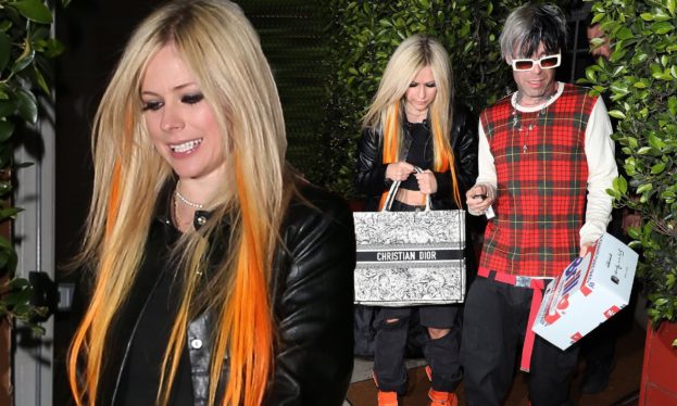 Avril Lavigne Steps Out in Oversized Blazer & Sleek Haircut for Paris Fashion Week