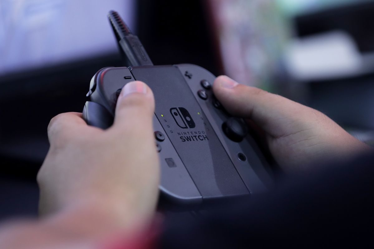 Nintendo cuts sales forecast for its ageing Switch console after disappointing holiday season