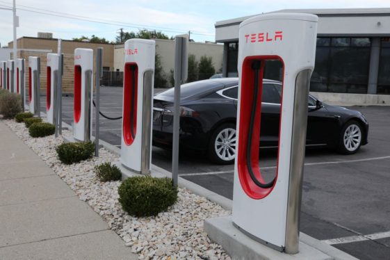 To tap U.S. government billions, Tesla must unlock EV chargers