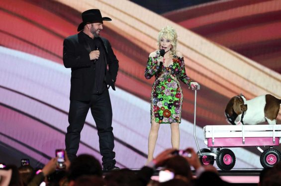 Dolly Parton Brings Out a Live Goat, Jokes About a Garth Brooks & Trisha Yearwood Threesome at 2023 ACM Awards 