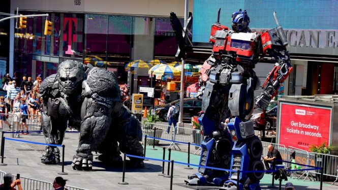Check out Optimus Primal and Optimus Prime Chilling in Times Square