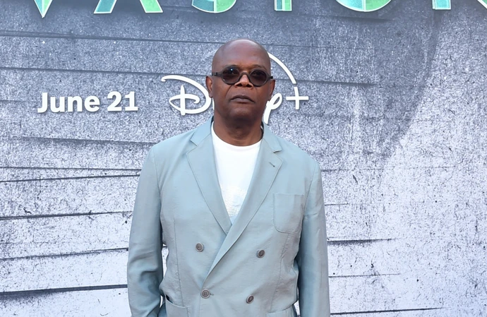 Samuel L. Jackson Defends Ryan Reynolds Action Comedy After Sequel’s Bomb: “We’re Having A Great F——ing Time”