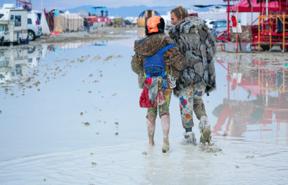 Burning Man Gates Close, Thousands Told to Shelter in Place Due to Heavy Rain & Muddy Conditions