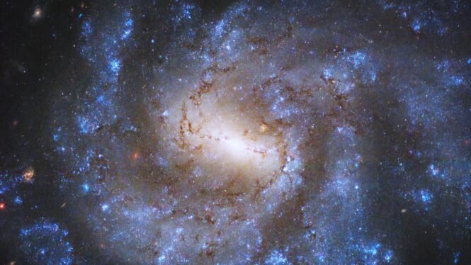 Hubble Telescope captures star-packed galaxy spinning like a top (photo)