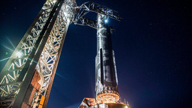 SpaceX shares stunning night shots of festive-looking Super Heavy rocket