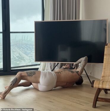 Victoria Beckham Shares Photo of ‘Electrician’ David Beckham Fixing Their TV in His Underwear