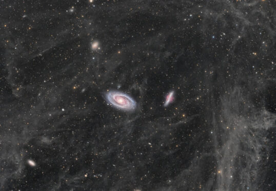 Daily Telescope: Two large galaxies swimming in a sea of interstellar dust