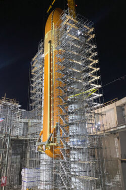 Last built-for-flight external tank lifted into place for space shuttle Endeavour exhibit