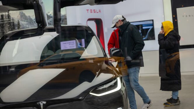 Tesla says EV sales growth may be “notably lower” in 2024