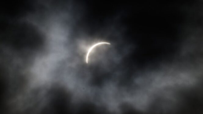 ‘You could feel the energy and wonder’: Despite clouds, totality wows crowds during solar eclipse in Syracuse