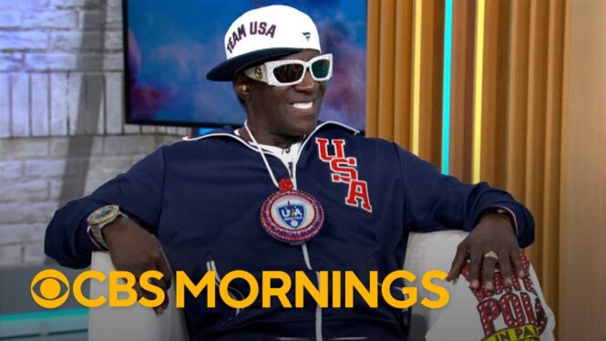 Flavor Flav Taking Olympics Hype Man Duties Seriously, Pledges $1,000 & Cruise Voyage For All U.S. Women’s Water Polo Team Members