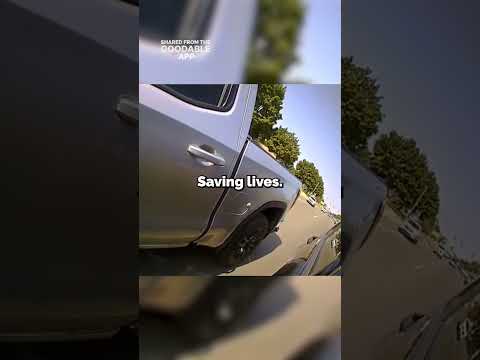 Police Officer Hops Into a Moving Vehicle to Stop it From Crashing #shorts