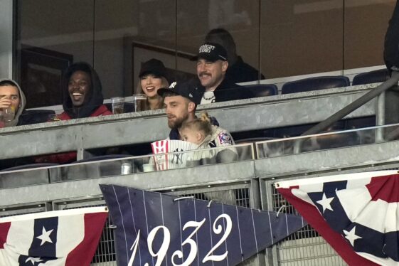 Taylor Swift & Travis Kelce Rock Black Baseball Caps to Game 1 Between the New York Yankees & Cleveland Guardians