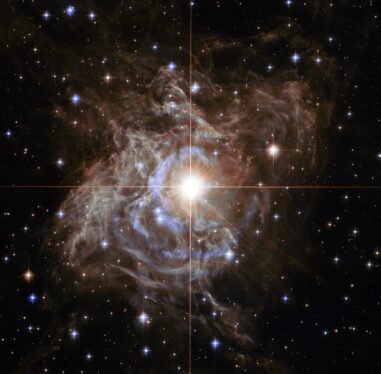 NASA telescopes capture a cosmic wreath for the holidays